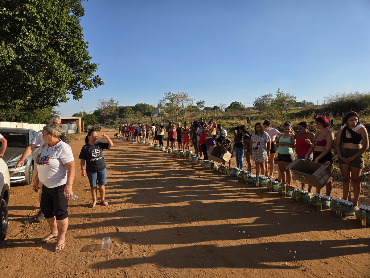 Food packages lined up along the road, ready for the families